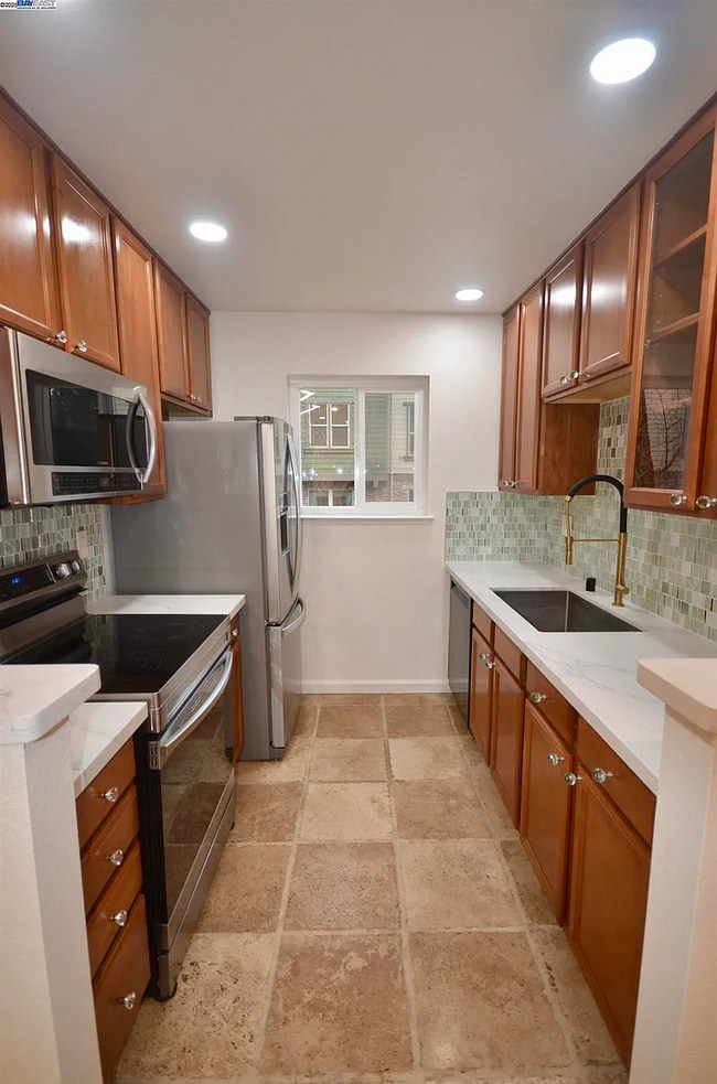 Building Photo - A charming condo nestled in the vibrant he...