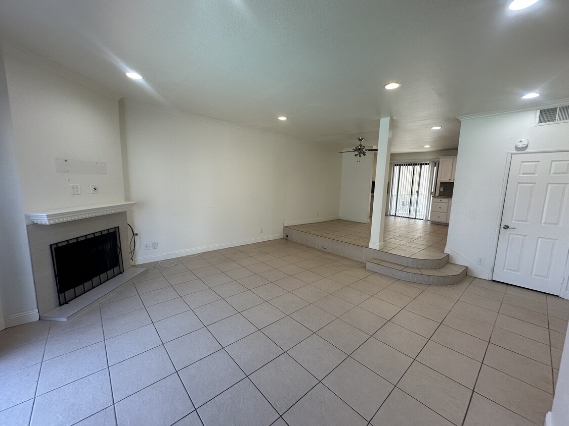 Living Room - Dining Room and 1/2 bathroom from front door. Direct access to garage from side exit d - 22865 Del Valle St