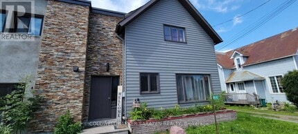 Building Photo - 6610 Fourth Line Rd