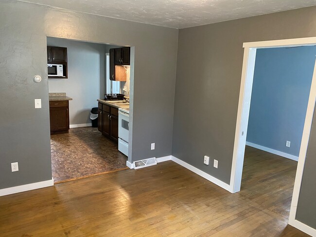 Open Concept Living room entry to Kitchen - 167 W 23rd Ave