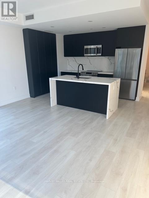 Photo du bâtiment - 415-415 Sea Ray Ave