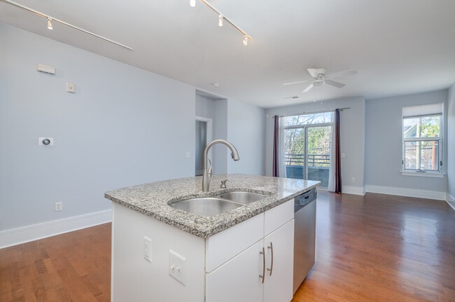 From the kitchen looking at the island and the living room and dining area - 1600 Fulton Ave