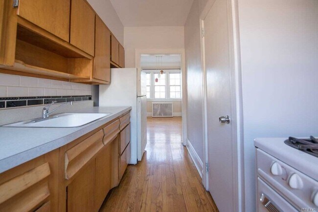 Building Photo - 214-14-214-36 36th Ave