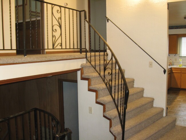 Staircase from Living room - 202 S Raynor Ave