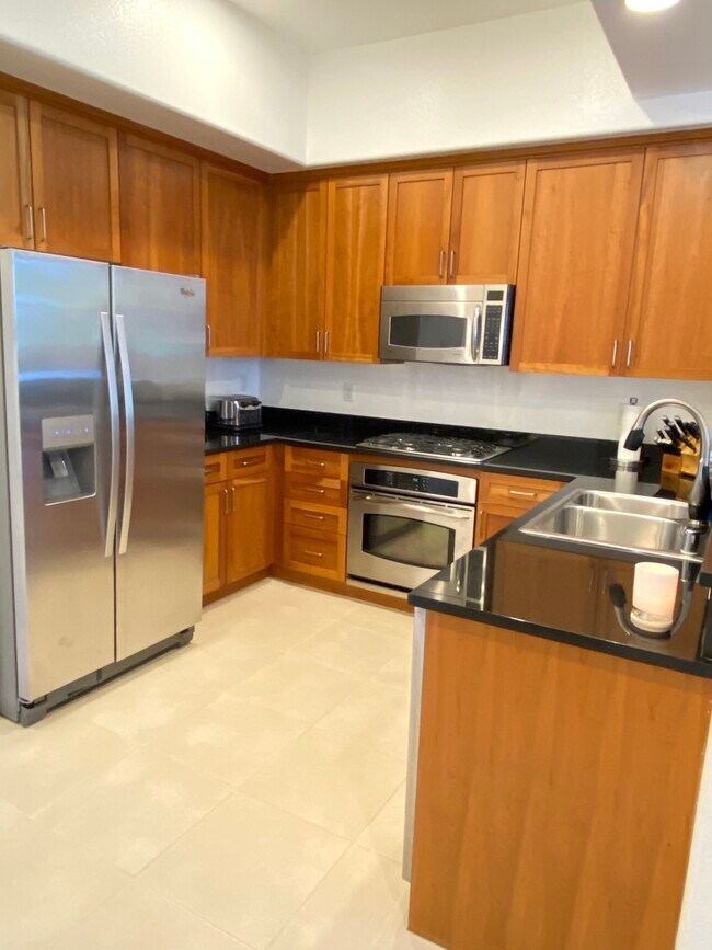 Kitchen with stainless steel appliances - 68 E Serene Ave