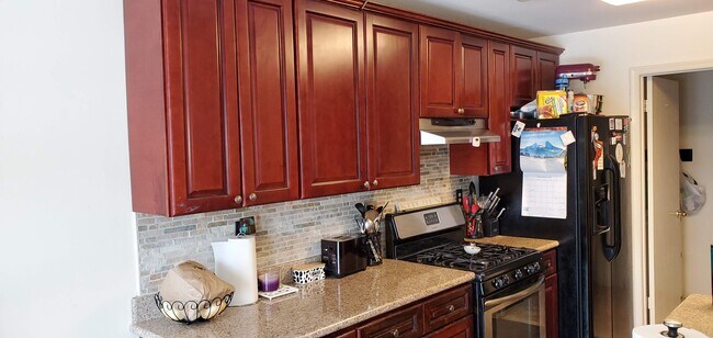 Gorgeous cherry cabinets - 650 Alder Ct