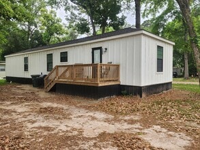 Building Photo - Whispering Pines