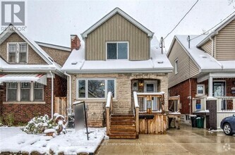 Building Photo - 128-128 Cameron Ave N