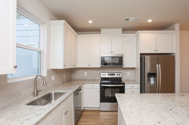 Building Photo - NEW CONSTRUCTION AT A GREAT RENTAL PRICE. ...