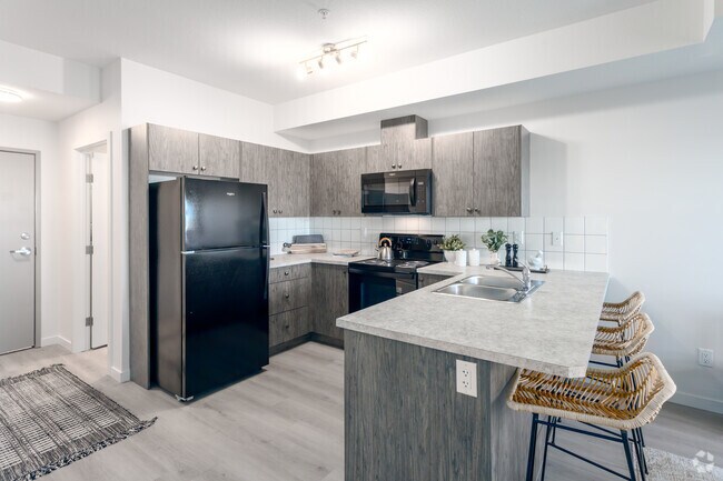 1 chambre, 1 salle de bain avec bureau - 672 pi² - Cuisine - Timber Pointe Apartments