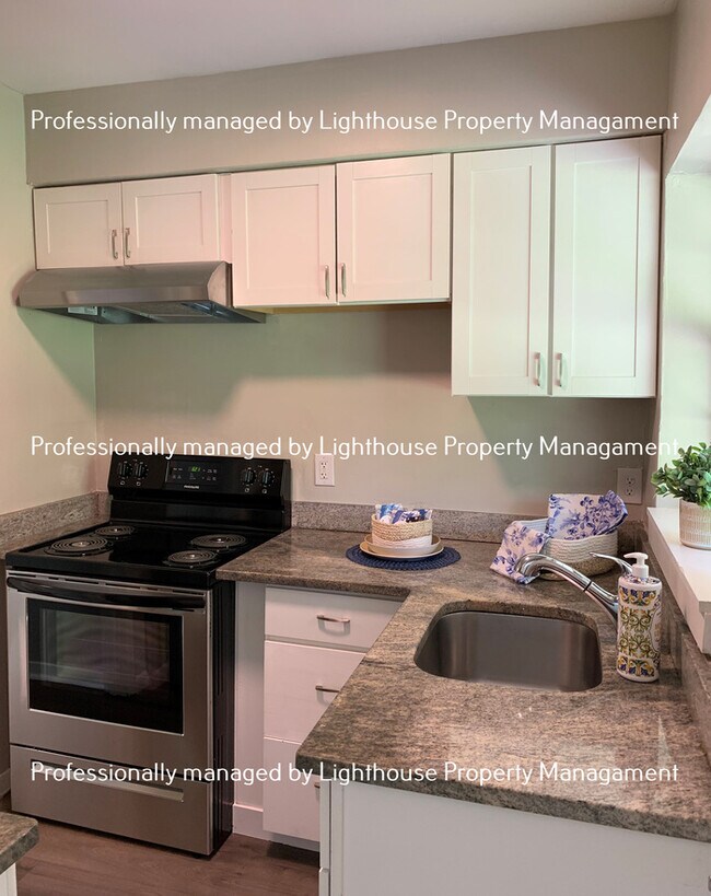 Foto del edificio - Bright 3 Bedroom Home With Open Layout And Storage Space