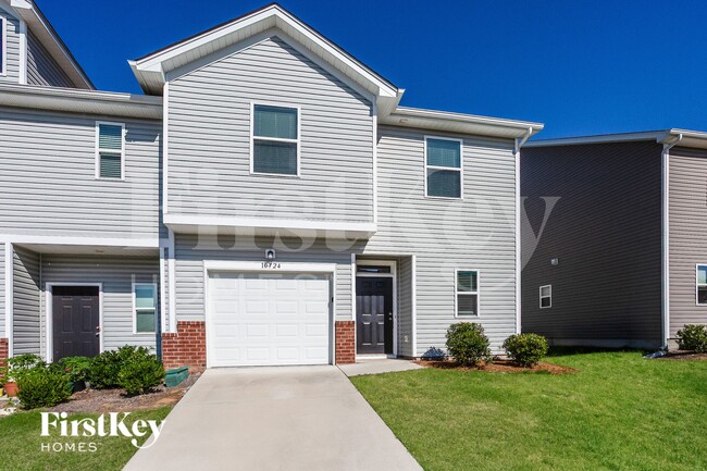 Foto del edificio - 10724 Rivergate Dr NW