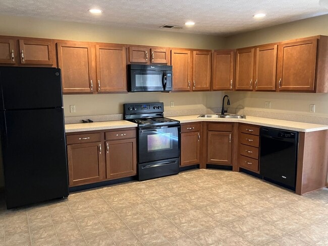 Building Photo - Spacious Two-Story Townhome with Attached Garage!