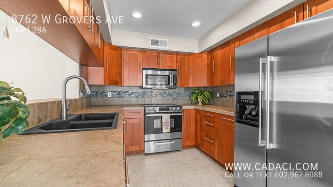 Foto del edificio - 8762 W Grovers Ave