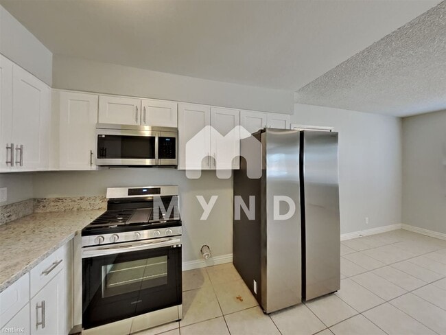 Building Photo - 4 br, 1.5 bath House - 893 W Carey Ave