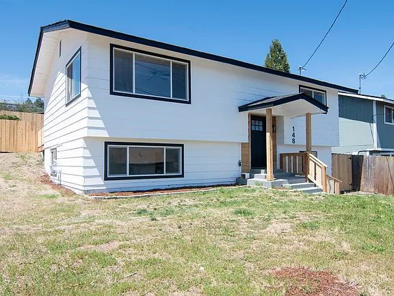 Building Photo - "Charming 5-Bed Sanctuary with Cozy Fireplace on South Rogers Street!"