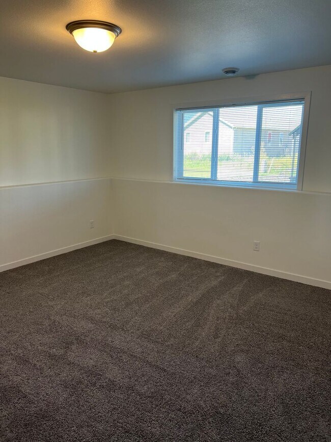 Building Photo - New 3 Bedroom/3 Bathroom House