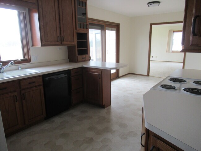 Kitchen with view out the window - 6507 Lani Ln