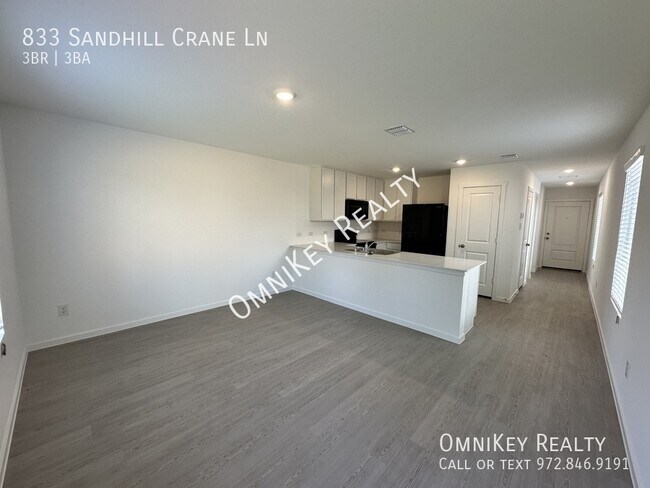 Foto del edificio - 833 Sandhill Crane Ln