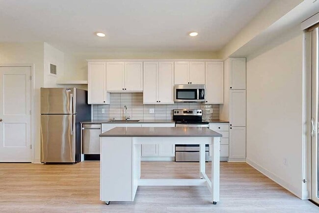 Bright, open kitchens create an inviting space for morning coffee, casual meals at the island, and effortless flow into the rest of your day. - The Rowan