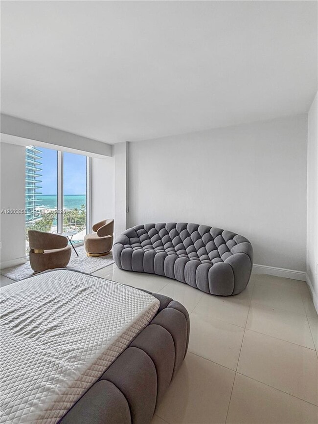 Building Photo - 10275 Collins Ave