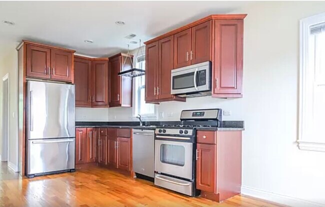 Foto del edificio - 2229 W Wellington Ave