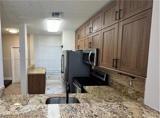 Photo - 443 S W 122nd Terrace Townhome