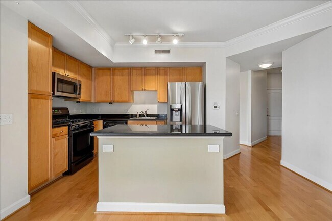 Building Photo - Fabulous, Corner 2BR, 2BA with Reserved Garage Parking Between Dupont and Logan Circle!!