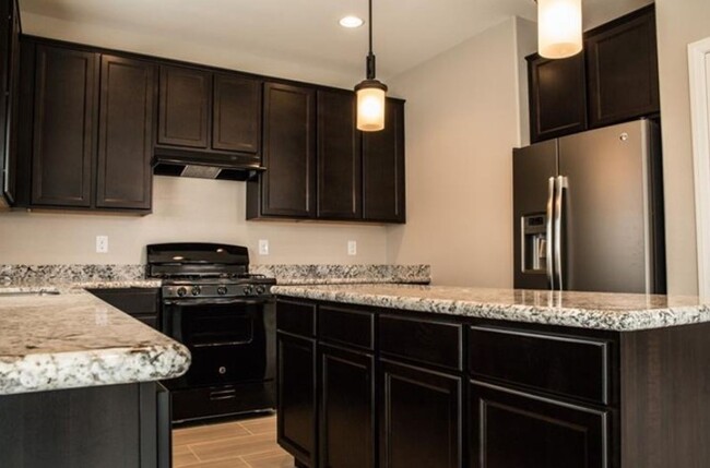 Building Photo - COMING SOON Beautiful 4 bedroom SW Area Ho...