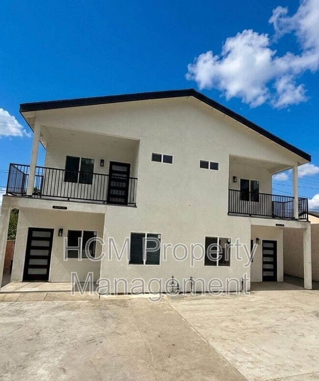 Building Photo - 5233 Bellflower Blvd