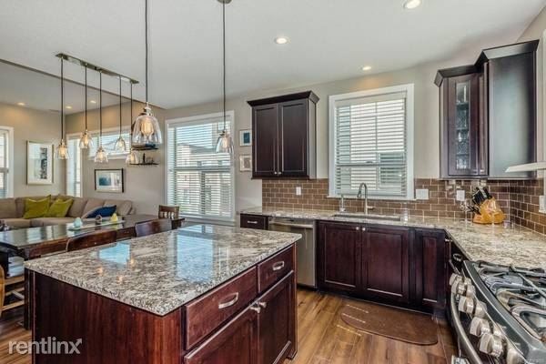 Foto principal - 3 br, 2.5 bath Townhome - 9046 E 50th Ave