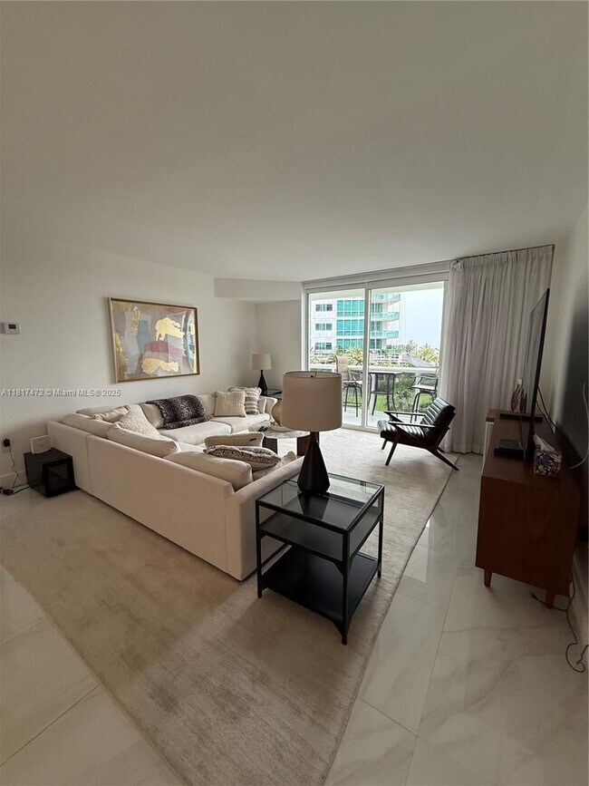 Building Photo - 10275 Collins Ave