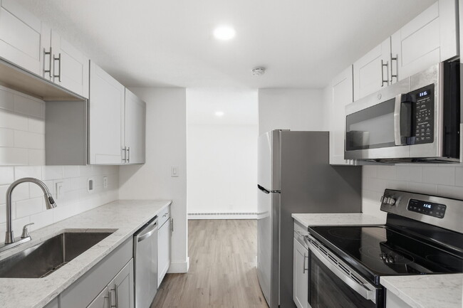 Photo - $1,400.95 with $300.00 off the first month's rent, 2 Beds - 1 Bath, Triplex in Aurora with Washer... Apartment