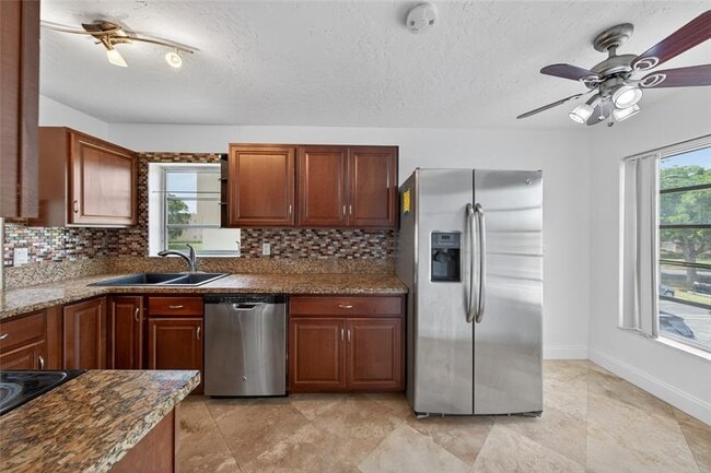 Building Photo - 6070 NW 64th Ave