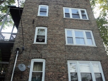 Building Photo - 7040 S Emerald Ave