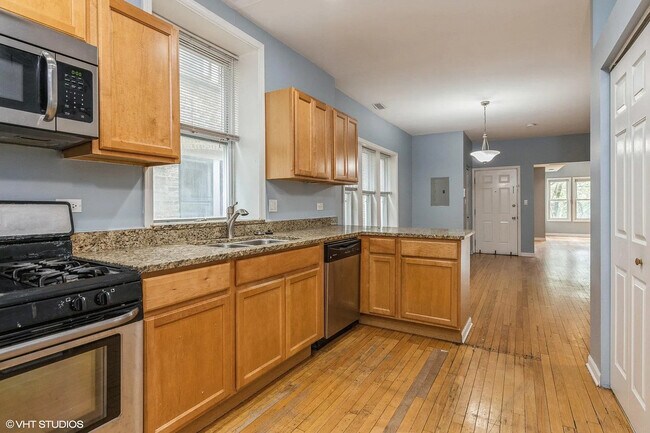 Foto del edificio - 6239 N Claremont Ave