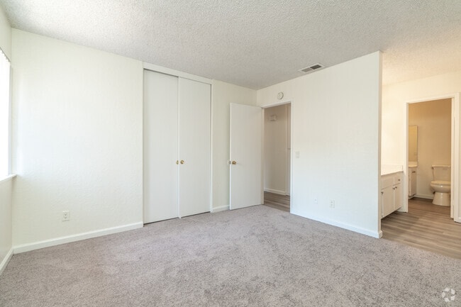 2BR, 1BA - 1025SF - Primary bedroom 2 - Cinnamon Creek Apartments