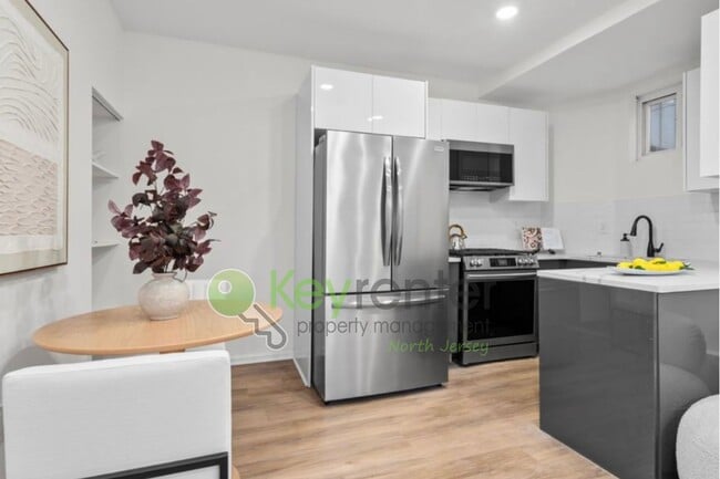 Photo - Rare Renovated 3BR/2BA Townhouse with Private Yard & NYC Views