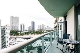 Building Photo - 19390 Collins Ave
