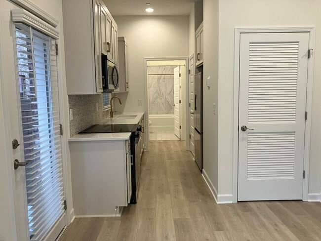 Building Photo - Price Improvement! New Condo In Spring Hil...