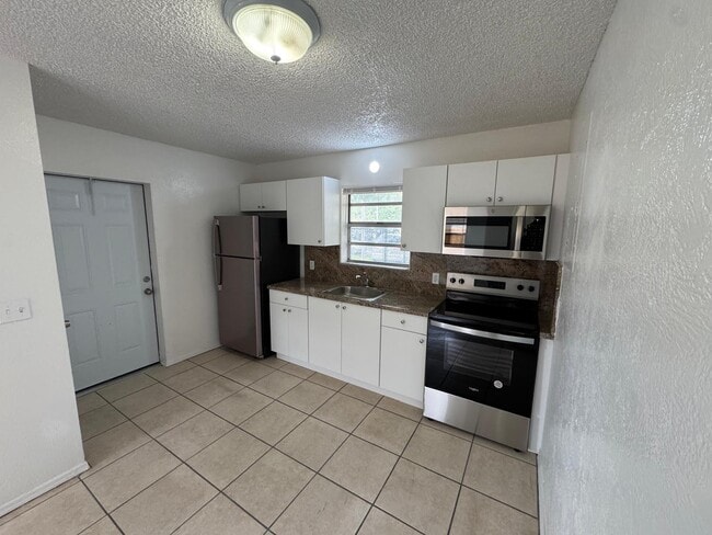 Photo - 300 NW 28th Way House