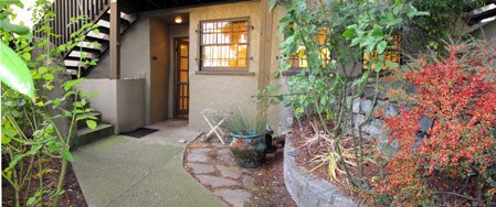 Private entrance with patio amongst our rose gardens. - 1029 Summit Ave E