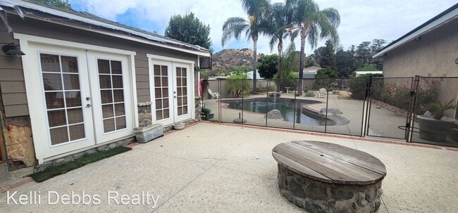 Building Photo - 4 br, 2.5 bath House - 10453 La Tuna Canyo...