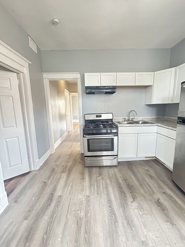Foto del edificio - 6601 S Langley Ave