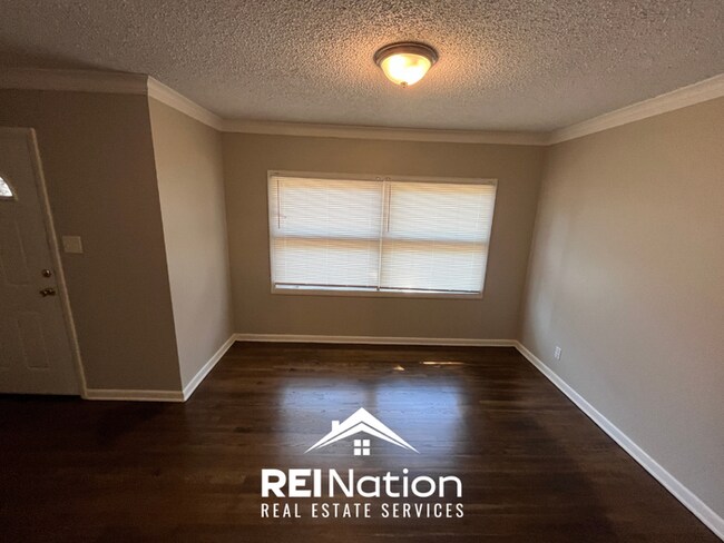 Building Photo - SPRAWLING MEMPHIS GEM! 3BR/2BA w/ Brick Fireplace | Fenced Yard & 1,870 SQ FT!