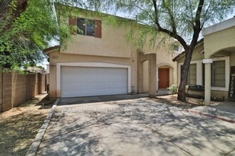 Building Photo - 1330 S Red Rock St
