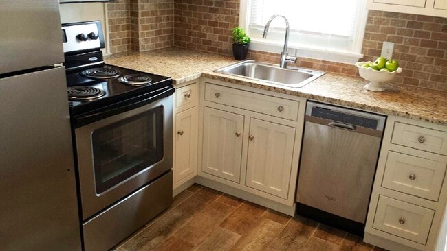 Building Photo - The Residences at Garden City