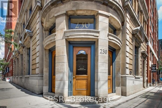 Building Photo - 230-1230 King St E