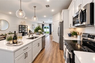 Building Photo - The Village at Hinckley Oaks