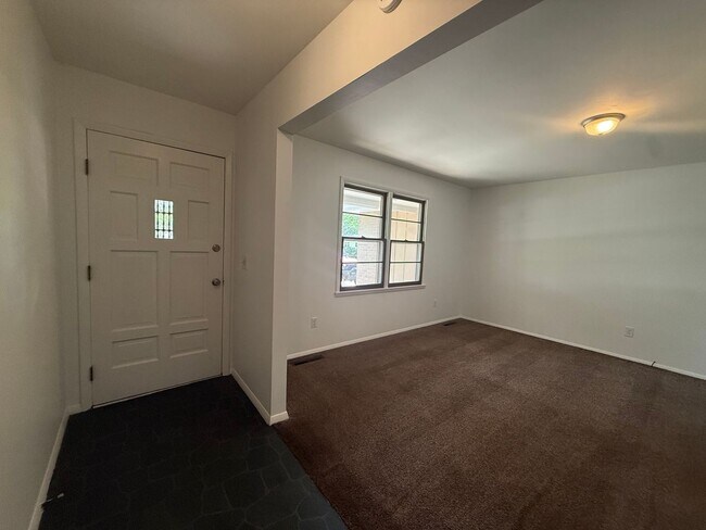 Building Photo - LOCATION! Check out this spacious 3 bedroom with 2.5 baths!